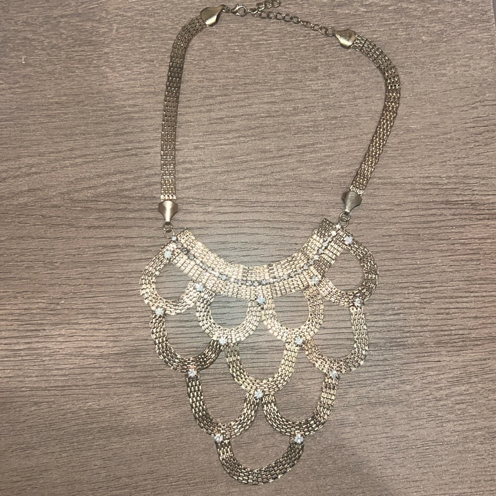 Intricate gold statement necklace